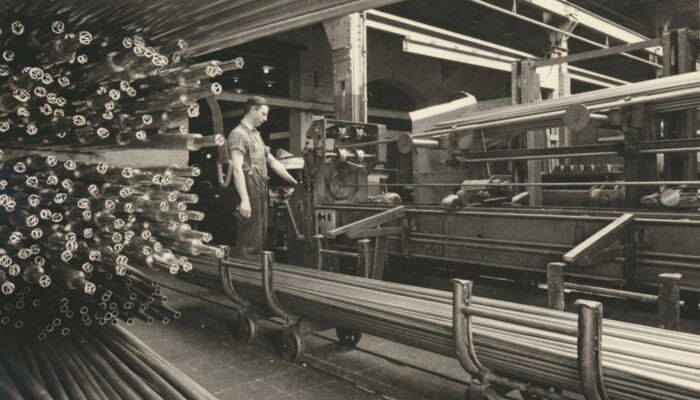 Employees at machine